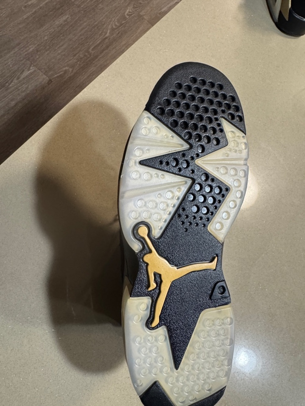 Jordan outsole with black, translucent and gold Jumpman